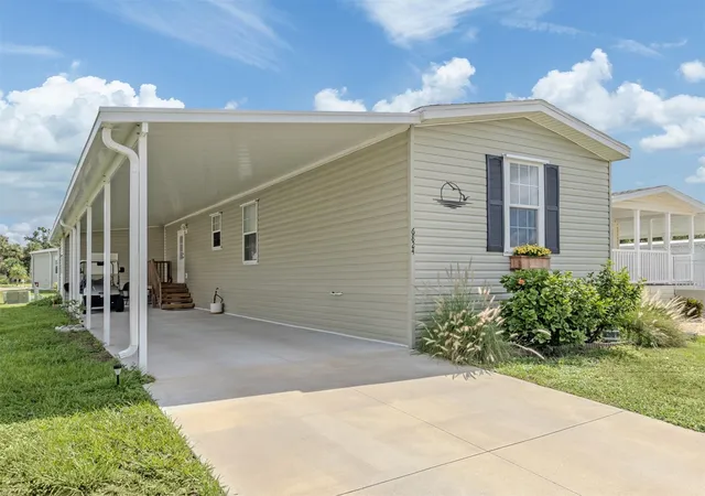 Photo 3 of Manufactured home for sale at 6824 Haawi Ct, North Port, FL 34287 | MLS# N6145602 | Listing updated on 2026-09-11