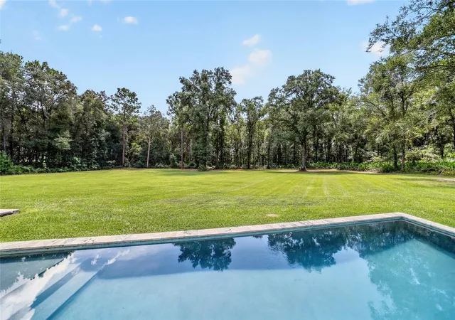 Photo 2 of Single family home for sale at 5854 Ne 43rd Lane Rd, Silver Springs, FL 34488 | MLS# OM731603 | Listing updated on 2026-09-22