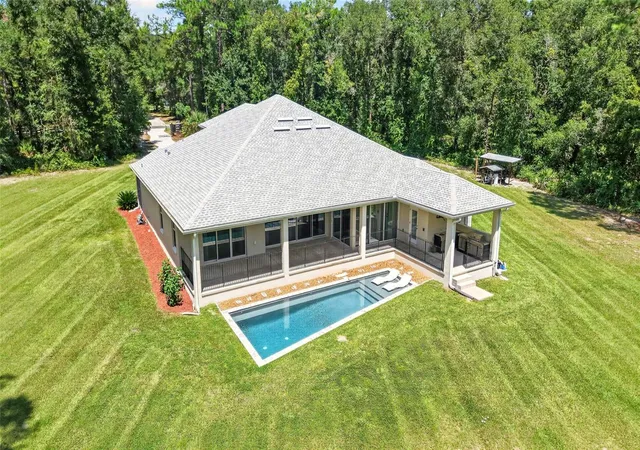 Photo 3 of Single family home for sale at 5854 Ne 43rd Lane Rd, Silver Springs, FL 34488 | MLS# OM731603 | Listing updated on 2026-09-22