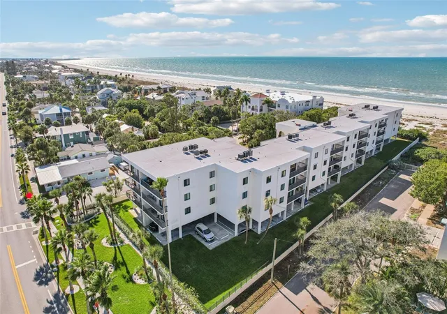 Listing Photo 1 - Condo for sale in building located at 3200 Gulf Blvd, Belleair Beach, FL 33706 - Unit #205