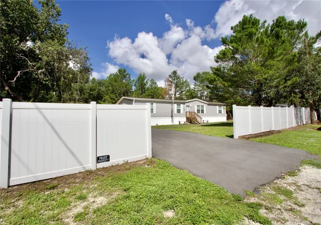 Photo 2 of Manufactured home for sale at 9669 Marley Ave, New Port Richey, FL 34654 | MLS# W7889171 | Listing updated on 2026-09-10