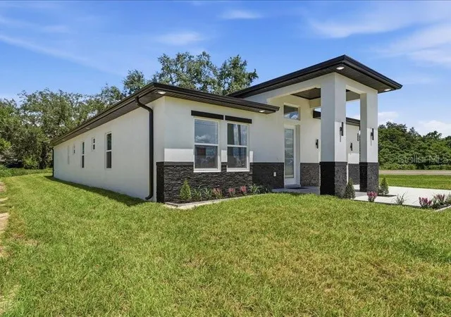 Photo 2 of Single family home for sale at 2011 Recker Hwy, Winter Haven, FL 33880 | MLS# TB8545235 | Listing updated on 2026-09-14