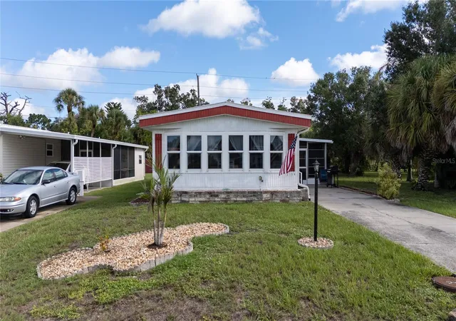 Photo 2 of Manufactured home for sale at 2754 Tanager Ln, Englewood, FL 34224 | MLS# N6145608 | Listing updated on 2026-09-14