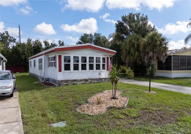 Photo 3 of Manufactured home for sale at 2754 Tanager Ln, Englewood, FL 34224 | MLS# N6145608 | Listing updated on 2026-09-14