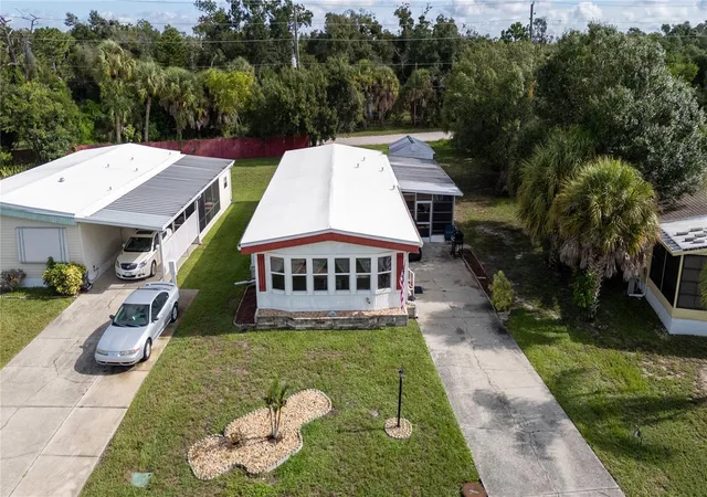 Photo 3 of Manufactured home for sale at 2754 Tanager Ln, Englewood, FL 34224 | MLS# N6145608 | Listing updated on 2026-09-14