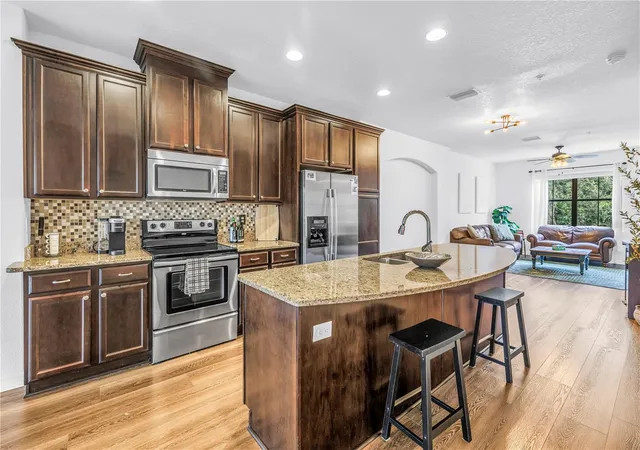 Photo 3 of Townhouse for sale at 9715 Bay Grv Ln, Tampa, FL 33615 | MLS# TB8545444 | Listing updated on 2026-09-26