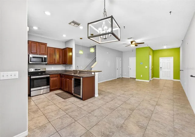 Photo 4 of Townhouse for sale at 9754 Pembrooke Pines, Sun City Center, FL 33573 | MLS# TB8545544 | Listing updated on 2026-09-10