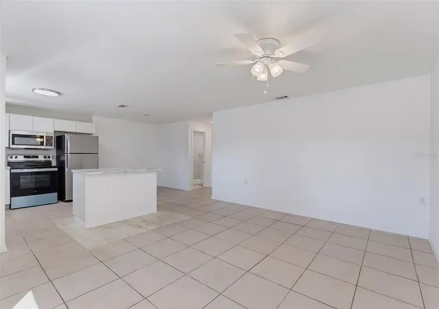 Photo 3 of Condo for sale at 6310 Providence Cir #4, New Port Richey, FL 34652 | MLS# W7889206 | Listing updated on 2026-09-11