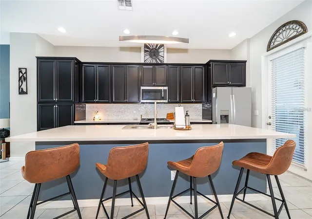 Photo 2 of Townhouse for sale at 727 Catalonia Cvs, Oviedo, FL 32765 | MLS# O6439301 | Listing updated on 2026-09-11