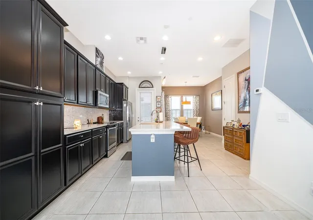 Photo 3 of Townhouse for sale at 727 Catalonia Cvs, Oviedo, FL 32765 | MLS# O6439301 | Listing updated on 2026-09-11