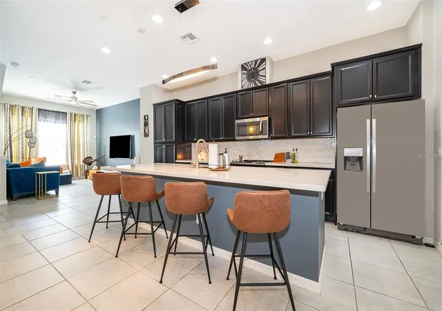 Photo 3 of Townhouse for sale at 727 Catalonia Cvs, Oviedo, FL 32765 | MLS# O6439301 | Listing updated on 2026-09-11