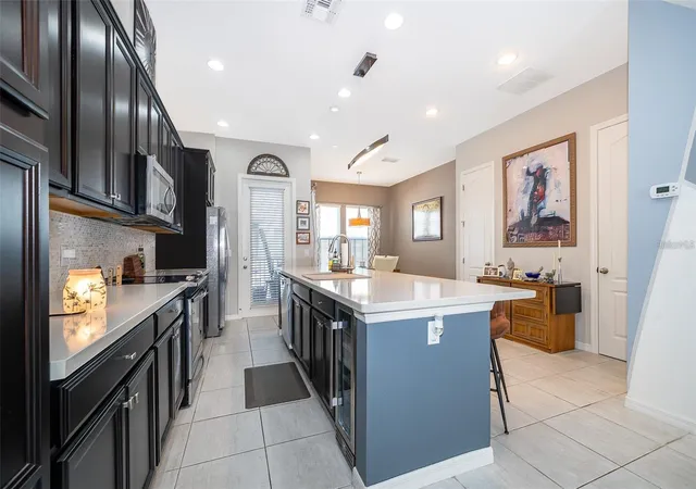 Photo 4 of Townhouse for sale at 727 Catalonia Cvs, Oviedo, FL 32765 | MLS# O6439301 | Listing updated on 2026-09-11