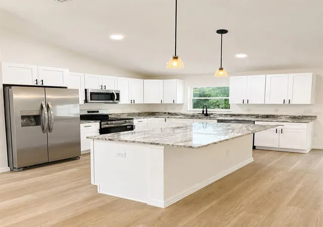 Photo 2 of Single family home for sale at 14418 Sw 16th Place, Ocala, FL 34481 | MLS# OM731738 | Listing updated on 2026-09-11