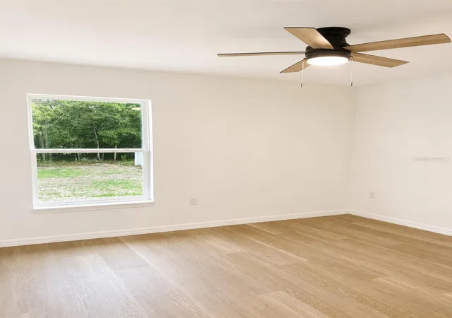 Photo 3 of Single family home for sale at 14418 Sw 16th Place, Ocala, FL 34481 | MLS# OM731738 | Listing updated on 2026-09-11