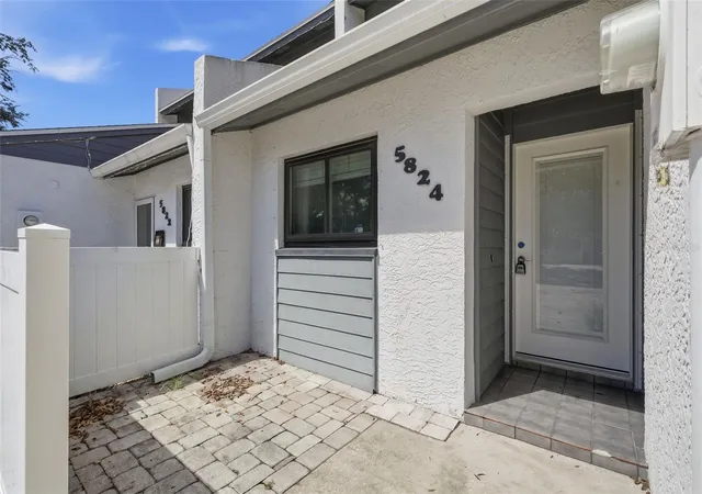 Photo 1 of Townhouse for sale at 5824 Idle Forest Pl, Tampa, FL 33614 | MLS# TB8545787 | Listing updated on 2026-09-18