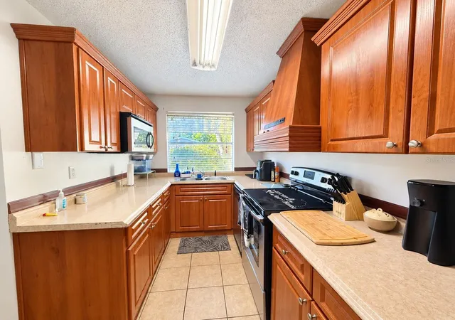 Photo 4 of Condo for sale at 7535 Abonado Rd #B, Tampa, FL 33615 | MLS# TB8545829 | Listing updated on 2026-09-14