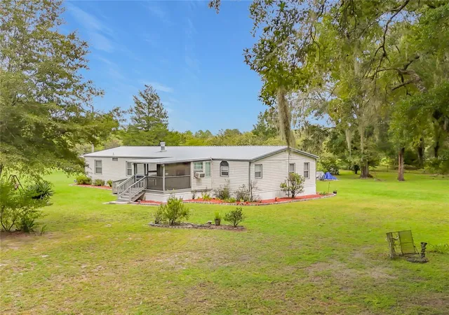 Manufactured home for sale at 8313 NW County Rd 235, ALACHUA, FL 32615 | MLS# TB8545874