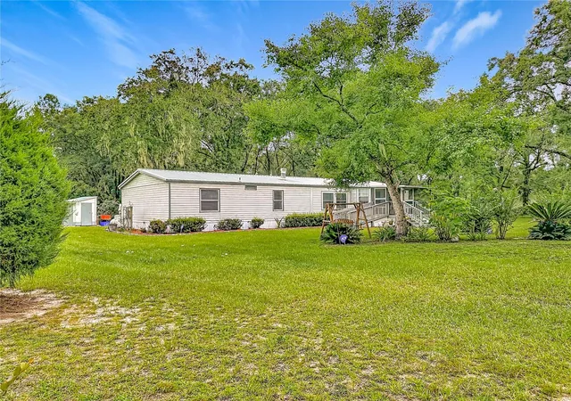 Photo 2 of Manufactured home for sale at 8313 Nw County Rd 235, Alachua, FL 32615 | MLS# TB8545874 | Listing updated on 2026-09-18