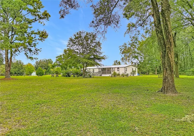 Photo 3 of Manufactured home for sale at 8313 NW County Rd 235, Alachua, FL 32615 | MLS# TB8545874 | Listing updated on 2026-09-18