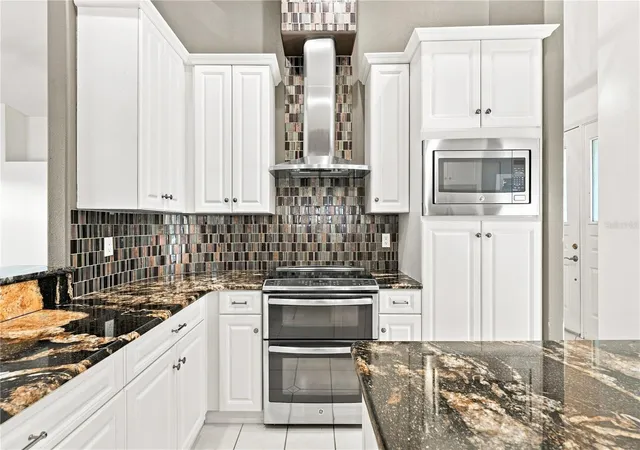 Photo 3 of Single family home for sale at 10097 Holly Berry Dr, Weeki Wachee, FL 34613 | MLS# W7889239 | Listing updated on 2026-09-14
