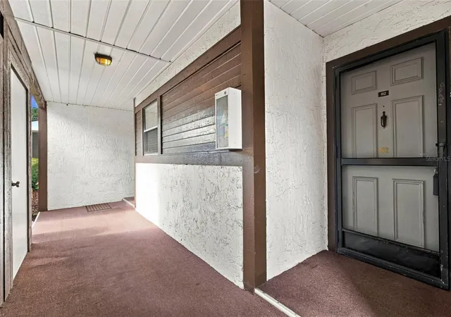 Listing Photo 5 - Condo for sale in building located at 4113 Passport Ln, NEW PORT RICHEY, FL 34653 - Unit #102