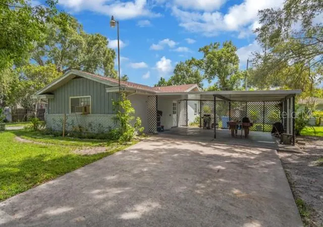 Photo 2 of Single family home for sale at 12009 Waterside Ct, Tampa, FL 33612 | MLS# TB8546240 | Listing updated on 2026-09-11