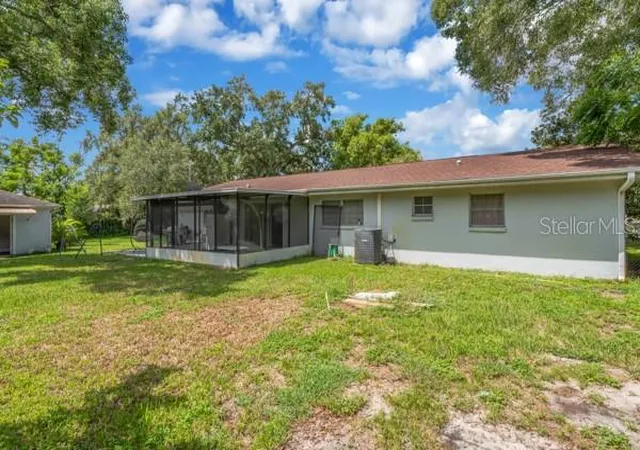 Photo 3 of Single family home for sale at 12009 Waterside Ct, Tampa, FL 33612 | MLS# TB8546240 | Listing updated on 2026-09-11