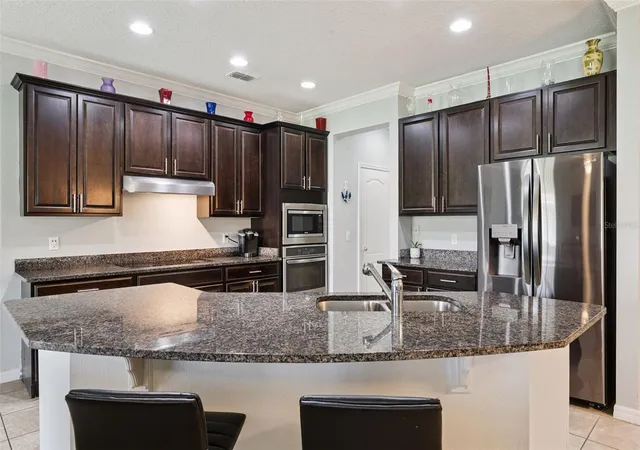 Photo 2 of Single family home for sale at 1945 Dunn Cvs Dr, Apopka, FL 32703 | MLS# O6439793 | Listing updated on 2026-09-15
