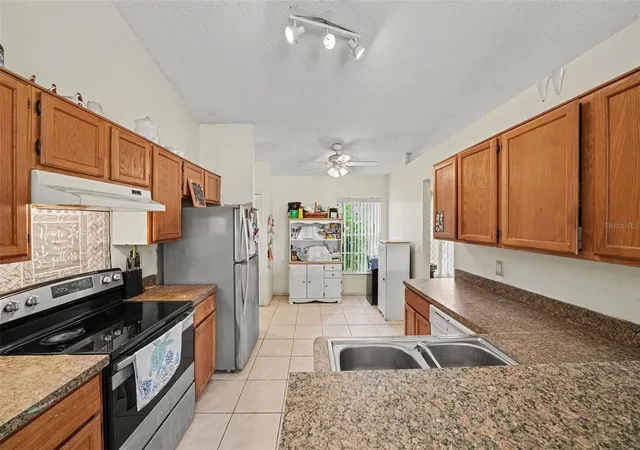 Photo 3 of Single family home for sale at 14807 Day Lily Ct, Orlando, FL 32824 | MLS# O6439851 | Listing updated on 2026-09-11