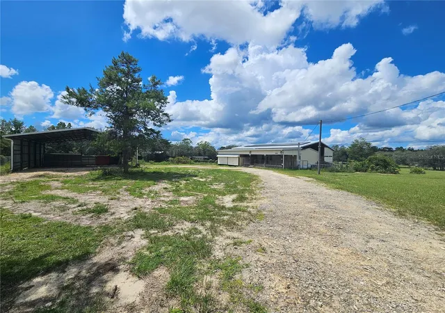 Photo 1 of Manufactured home for sale at 5950 NE 107th Court, Bronson, FL 32621 | MLS# OM731851 | Listing updated on 2026-09-29