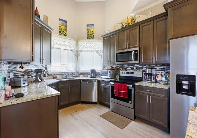 Photo 4 of Single family home for sale at 229 Cimarron Dr, Kissimmee, FL 34759 | MLS# O6439922 | Listing updated on 2026-09-14