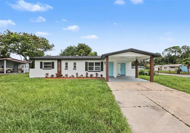 Photo 2 of Single family home for sale at 2720 Mars Dr, Titusville, FL 32796 | MLS# O6439933 | Listing updated on 2026-09-09