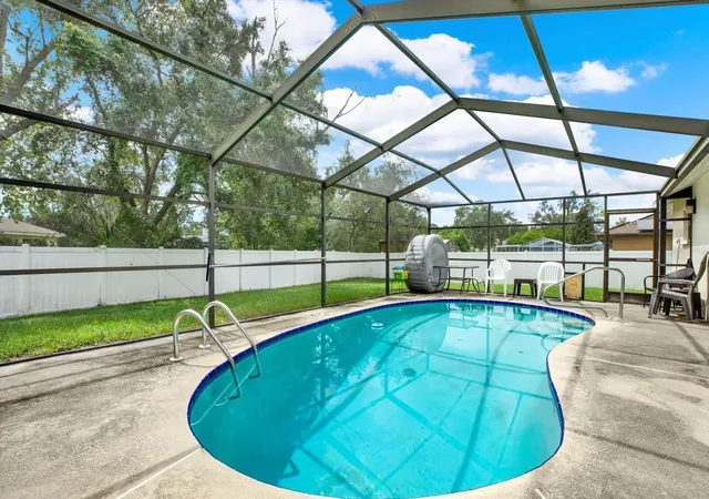 Photo 2 of Single family home for sale at 14260 Spring Hl Dr, Spring Hill, FL 34609 | MLS# W7889319 | Listing updated on 2026-10-03
