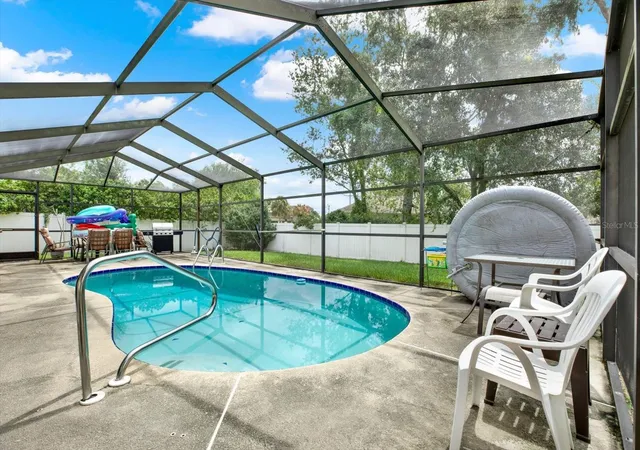 Photo 3 of Single family home for sale at 14260 Spring Hl Dr, Spring Hill, FL 34609 | MLS# W7889319 | Listing updated on 2026-10-03