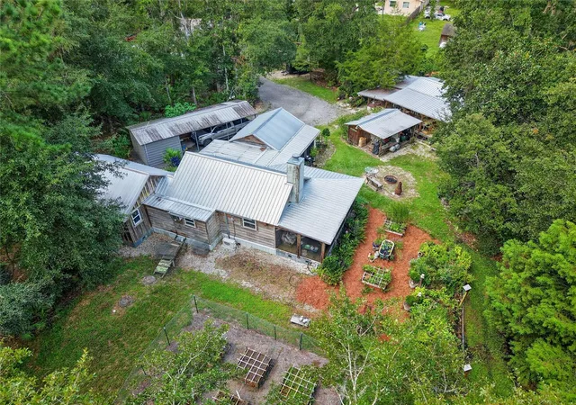 Single family home for sale at 5661 NW 219th Street Rd, MICANOPY, FL 32667 | MLS# GC543356