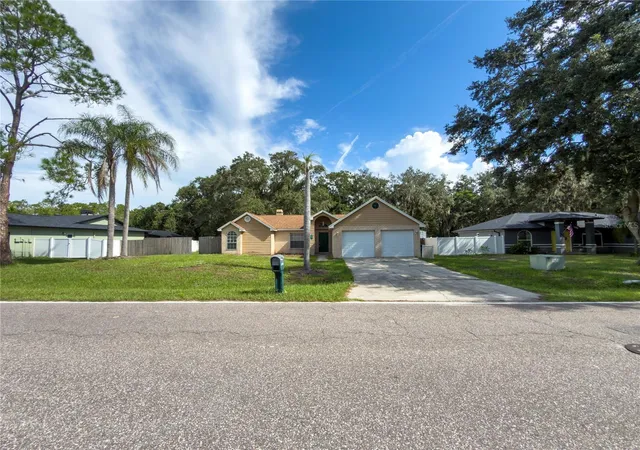 Photo 1 of Single family home for sale at 23437 Shining Star Dr, Land O Lakes, FL 34639 | MLS# W7889323 | Listing updated on 2026-09-23