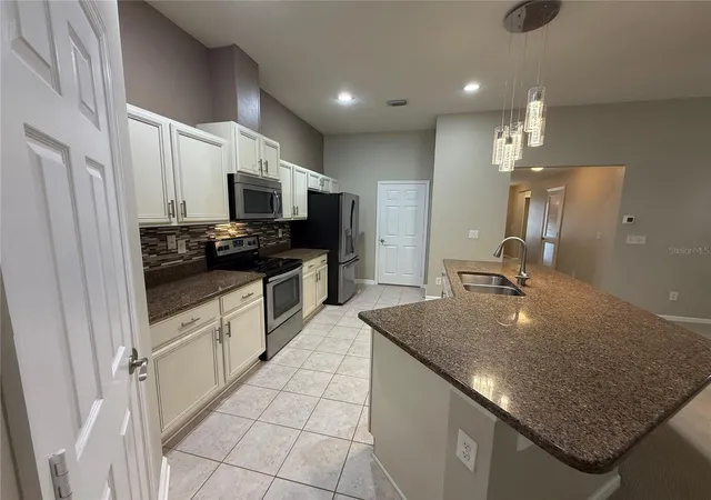 Photo 2 of Single family home for sale at 120 Prestwick Grande Dr, DAYTONA BEACH, FL 32124 | MLS# O6440263 | Listing updated on 2026-10-15