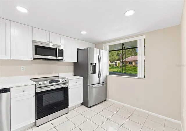 Listing Photo 4 - Condo for sale in building located at 11231 Dollar Lake Dr, Port Richey, FL 34668 - Unit #4