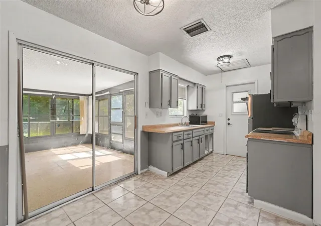 Photo 3 of Single family home for sale at 9661 Langan St, Spring Hill, FL 34606 | MLS# TB8546848 | Listing updated on 2026-09-11
