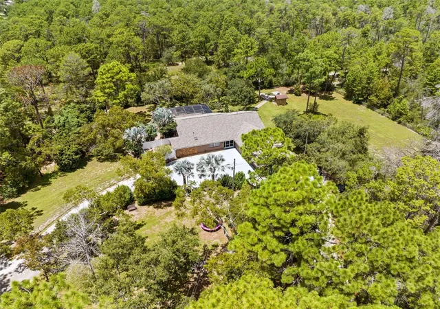 Photo 3 of Single family home for sale at 12348 Talpa St, Spring Hill, FL 34608 | MLS# W7889335 | Listing updated on 2026-09-11