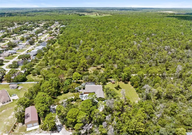 Photo 4 of Single family home for sale at 12348 Talpa St, Spring Hill, FL 34608 | MLS# W7889335 | Listing updated on 2026-09-11