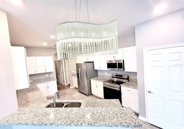 Photo 2 of Single family home for sale at 35006 Long Is Ct, Zephyrhills, FL 33541 | MLS# O6440359 | Listing updated on 2026-09-12