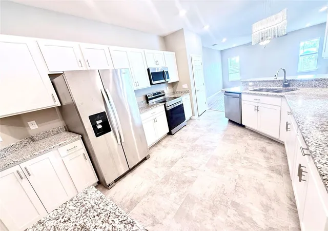 Photo 3 of Single family home for sale at 35006 Long Is Ct, Zephyrhills, FL 33541 | MLS# O6440359 | Listing updated on 2026-09-12