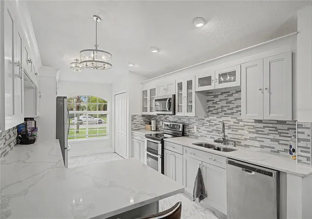Photo 4 of Single family home for sale at 212 Arbor Woods Cir, Oldsmar, FL 34677 | MLS# TB8546900 | Listing updated on 2026-09-24