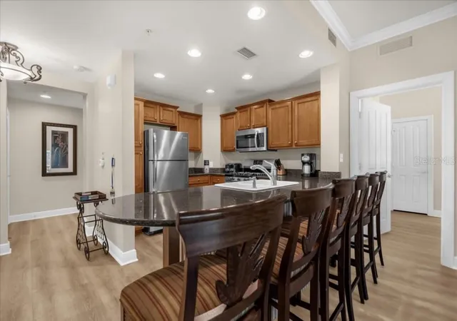Photo 4 of Condo for sale at 7697 Heritage Xing Way #101, Reunion, FL 34747 | MLS# O6440398 | Listing updated on 2026-09-11