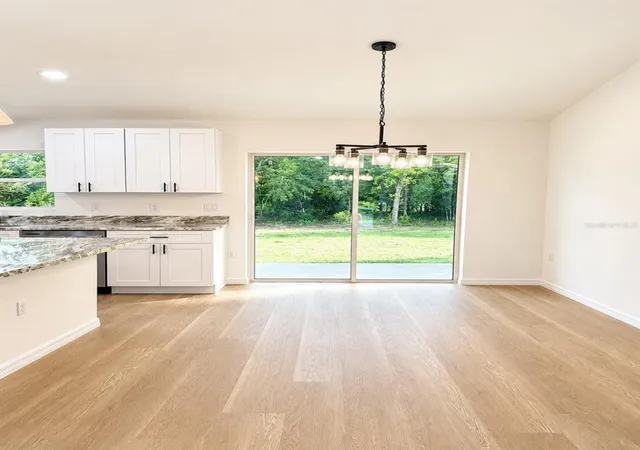 Photo 4 of Single family home for sale at 14406 SW 16th Place, Ocala, FL 34481 | MLS# OM731969 | Listing updated on 2026-09-11