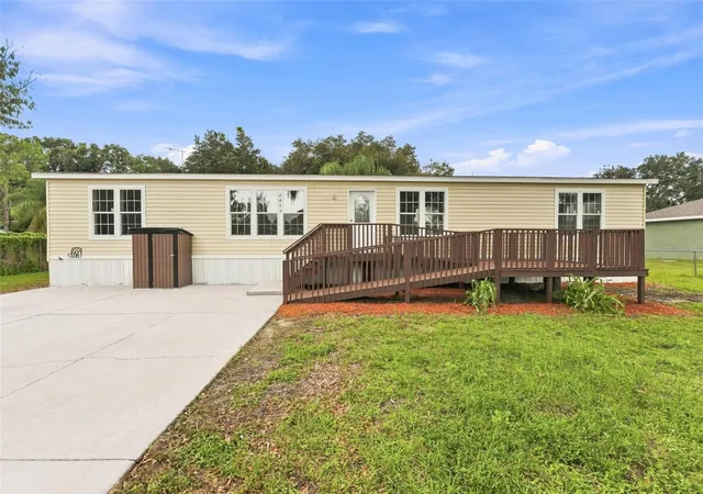Photo 1 of Manufactured home for sale at 6453 Mangrove Dr, Wesley Chapel, FL 33544 | MLS# W7889354 | Listing updated on 2026-10-09
