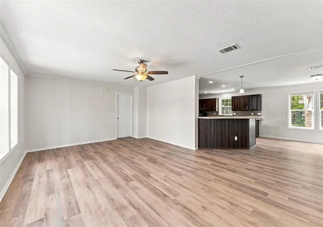 Photo 2 of Manufactured home for sale at 6453 Mangrove Dr, Wesley Chapel, FL 33544 | MLS# W7889354 | Listing updated on 2026-10-09