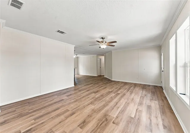 Photo 3 of Manufactured home for sale at 6453 Mangrove Dr, Wesley Chapel, FL 33544 | MLS# W7889354 | Listing updated on 2026-10-09