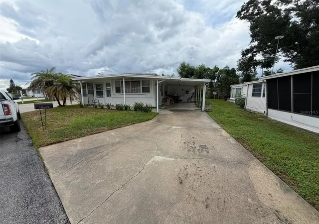 Photo 1 of Single family home for sale at 112 Holiday Ln, Auburndale, FL 33823 | MLS# O6440504 | Listing updated on 2026-10-07